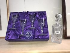 A boxed set of 4 Edinburgh crystal goblets & a decanter