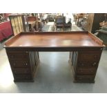 A mahogany double pedestal desk