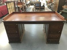 A mahogany double pedestal desk