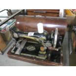 A cased Singer sewing machine