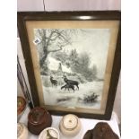 A vintage framed & glazed print of stags & deer outside a cottage entitled staved out
