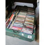 A box of assorted CDs