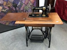 A sewing machine table and sewing machine