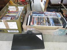 A quantity of DVDs including Blu-Ray and a Blu-Ray player