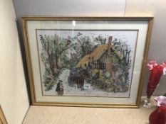 A fabulous framed & glazed embroidered village scene with thatched cottage & church