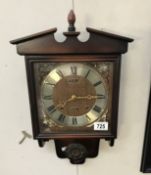 A President 30 day wall clock ****Condition report**** Fully wound, strikes,