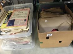 A box of 78 rpm records with a box of sheet music