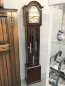 A Widdop modern dark wood stained long case clock