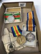 A quantity of WWI medals belonging to 100980 PTE E J Fuller MGC & WWII Defence medal in box to E-J