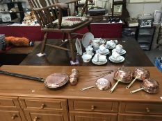 A collection of copperware including warming pan, 2 spirit measures,