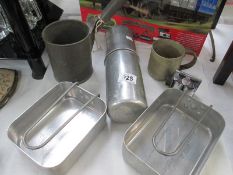 A vintage Walker ice flask, military mess tins etc.