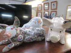 3 large pig figurines including Famille Rose porcelain pig