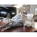 3 large pig figurines including Famille Rose porcelain pig