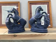 A pair of blue pottery horses A/F