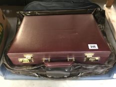 2 vintage luggage carriers including Samsonite and American Tourister and a briefcase