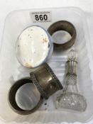 3 silver napkin rings & silver topped perfume bottle