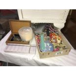 A box of beads & costume jewellery, watch & silver coloured chain etc.