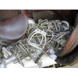 A large quantity of horse bits, stirrups etc.