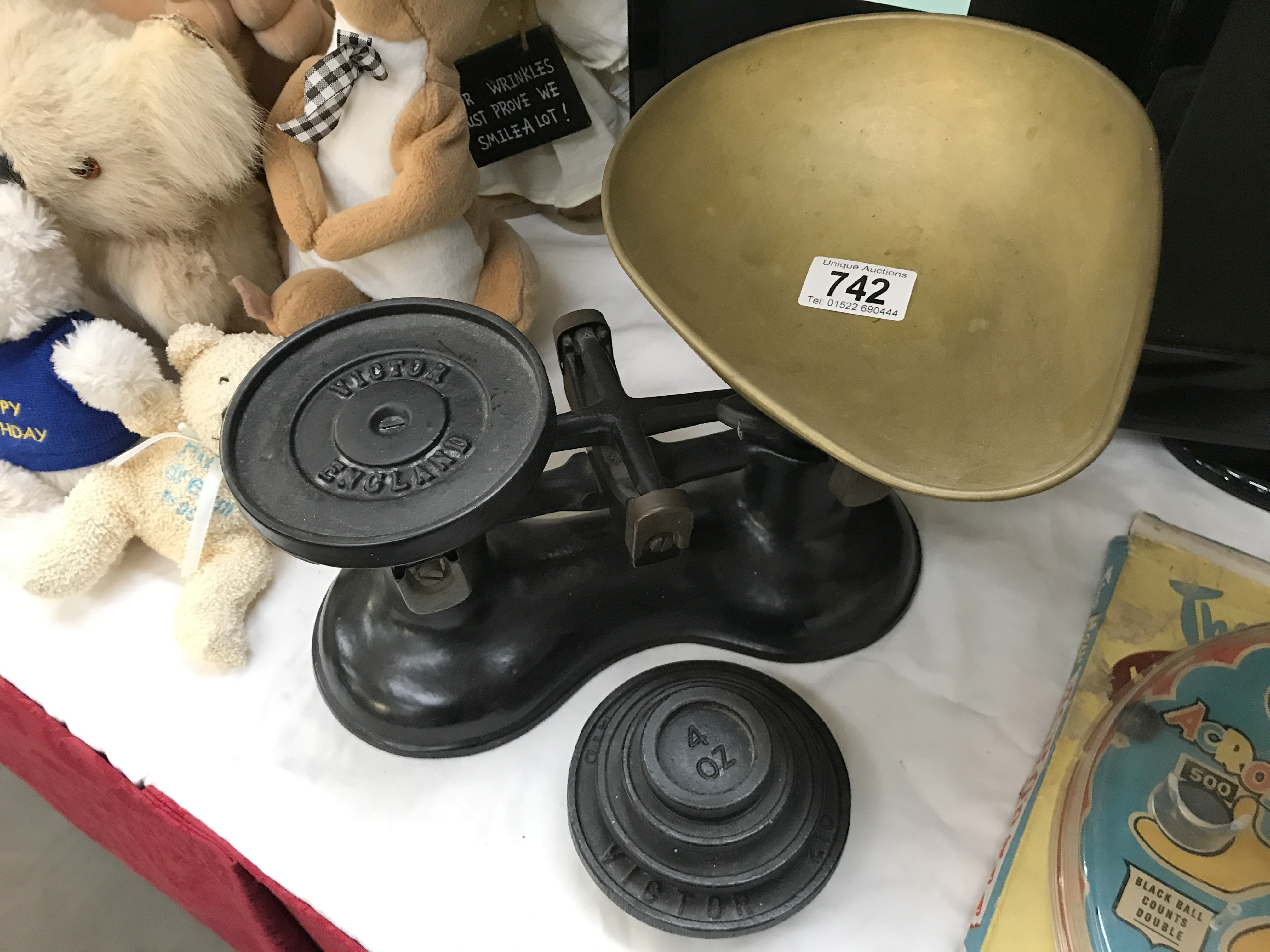 A cast iron Victor England kitchen scales & weights with brass pan