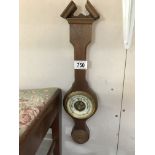 A small mahogany barometer