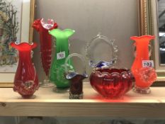 A quantity of pretty coloured glass vases etc.