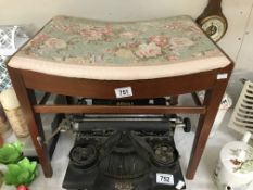 A dressing table stool