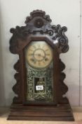 An American gingerbread mantle clock ****Condition report**** Fully wound, strikes,