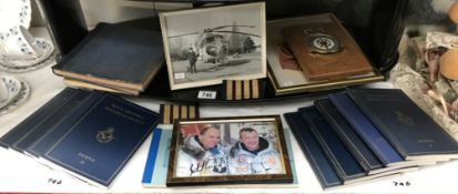 A quantity of Royal Air Force Historical society journals & signed photo of astronauts etc.