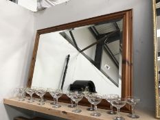 A large pine framed bevel edge mirror