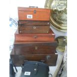 A quantity of vintage wooden boxes including a writing box