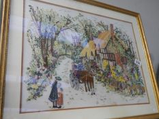 A lovely framed & glazed embroidered thatched cottage & church scene