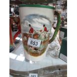 A First Over pottery tankard featuring hunt scene