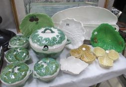 A collection of cabbage leaf dishes including lidded tureen