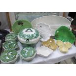 A collection of cabbage leaf dishes including lidded tureen