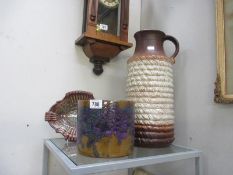 A large West Germany handled vase and two other pottery items