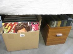 A box of LP records and a box of records