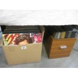 A box of LP records and a box of records