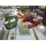 A Caso Pupo majolica crab dish and a duck dish