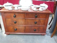 A 2 over 2 chest of drawers