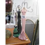 3 jewellery stands in the form of vintage ladies etc.