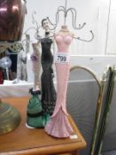 3 jewellery stands in the form of vintage ladies etc.