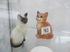 Two Beswick cats