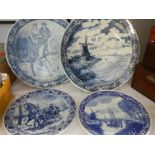 2 Delft blue and white chargers and 2 Delft plates