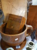 A quantity of treen wooden items including a very large cup and saucer, carved panels etc.