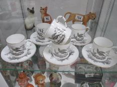 A set 6 piece Royal Worcester cups and saucers featuring birds