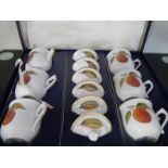 A Royal Worcester boxed set of coffee cups/cans with lids