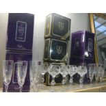A quantity of boxed Edinburgh crystal champagne flutes (4 x 2) and wine glasses (3 x 2) (some boxes