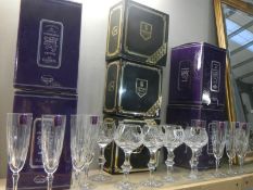 A quantity of boxed Edinburgh crystal champagne flutes (4 x 2) and wine glasses (3 x 2) (some boxes