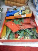 A tray of early Meccano pieces etc.