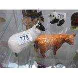 A Bewsick sheep and a Beswick Aberdeen Angus calf